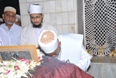 Maazoon Saheb doing the Ziyaarat of Muqaddas Maula